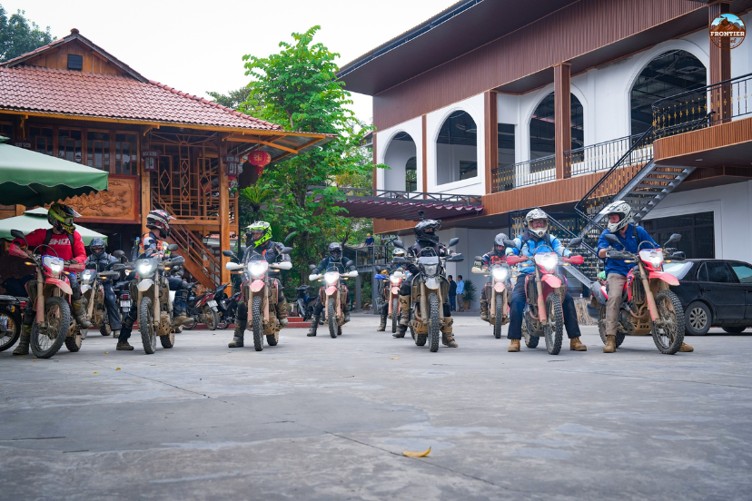 Morning at a local homestay in northern Vietnam, travelers preparing for a new motorbike journey
